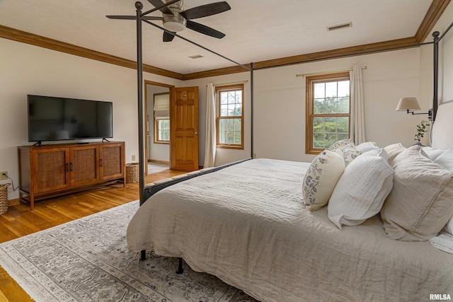5345 State Route 127th Hwy, Cobden, IL 62920 - bedroom featuring wood finished floors, ornamental molding, ceiling fan, and baseboards