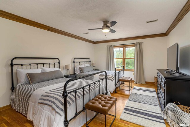5345 State Route 127th Hwy, Cobden, IL 62920 - bedroom featuring ornamental molding, wood finished floors, a ceiling fan, baseboards, and a textured ceiling