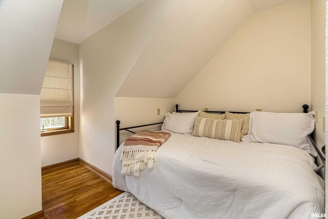 5345 State Route 127th Hwy, Cobden, IL 62920 - bedroom featuring vaulted ceiling, wood finished floors, and baseboards