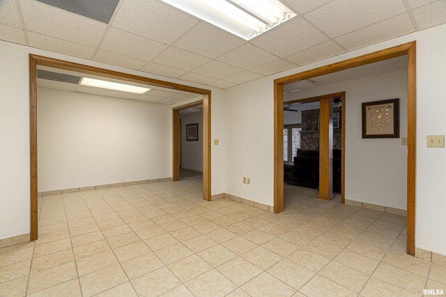 5345 State Route 127th Hwy, Cobden, IL 62920 - empty room with a drop ceiling, baseboards, and light tile patterned floors