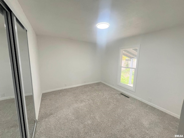 empty room with carpet floors