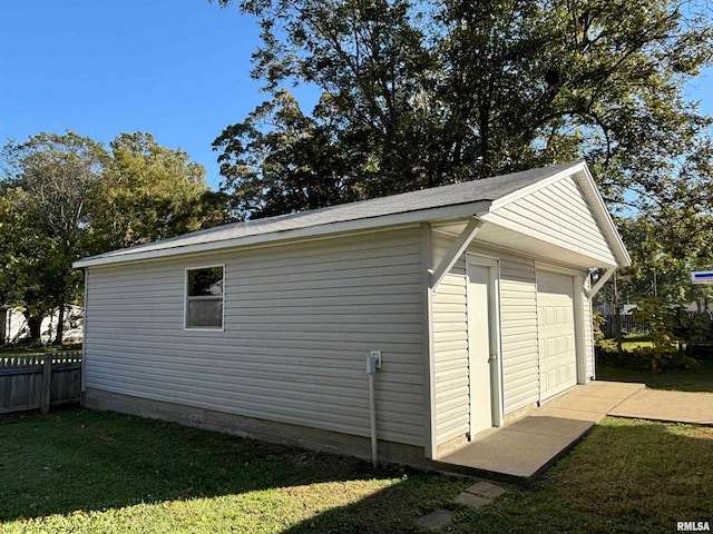 garage with a lawn