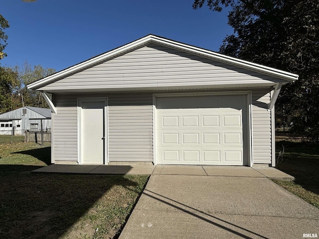 garage featuring fence