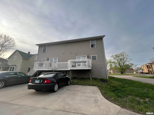 rear view of property with a deck