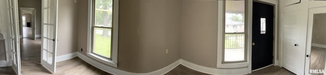 foyer entrance with dark hardwood / wood-style floors