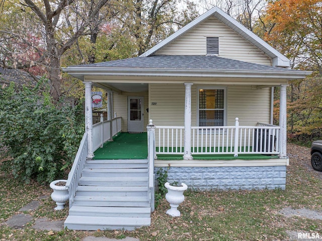 727 N Broadway Ave, Salem, IL 62881 - view of front facade with a porch and roof with shingles