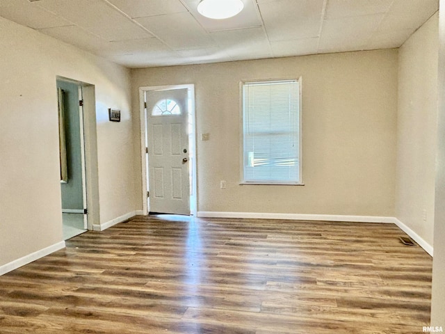 foyer with wood-type flooring