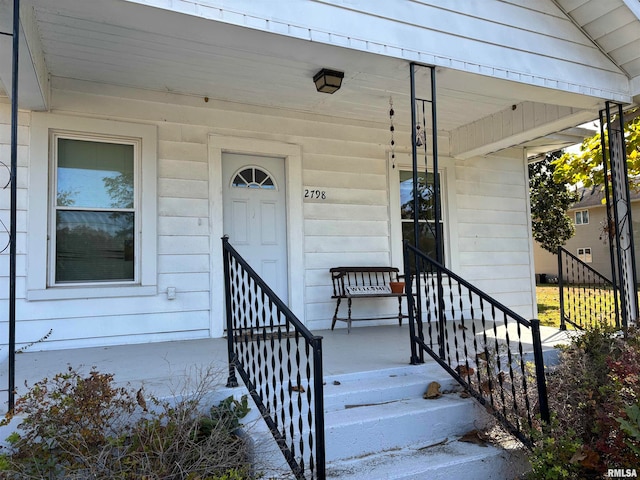 property entrance with a porch