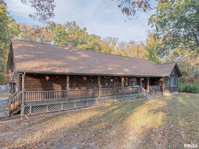 view of front of home with a deck