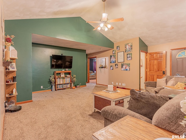 carpeted living room with vaulted ceiling and ceiling fan