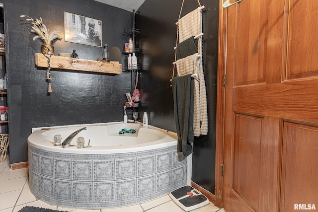 bathroom featuring tile patterned floors and tiled bath