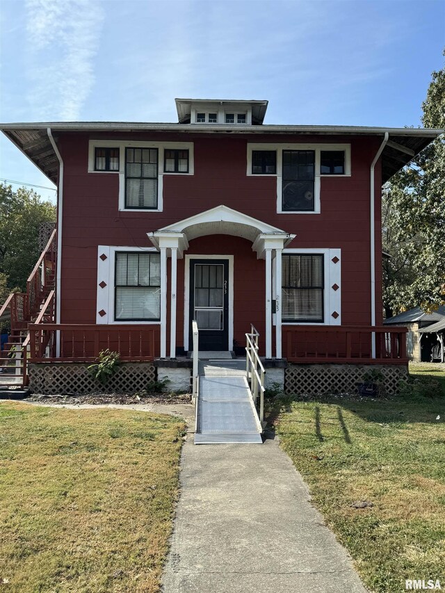 view of front of house with a front lawn