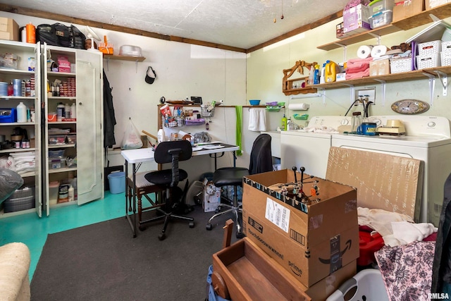 office area featuring concrete floors, crown molding, a textured ceiling, and washing machine and clothes dryer