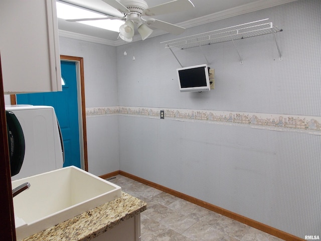 bathroom featuring sink, ceiling fan, washer / clothes dryer, and ornamental molding