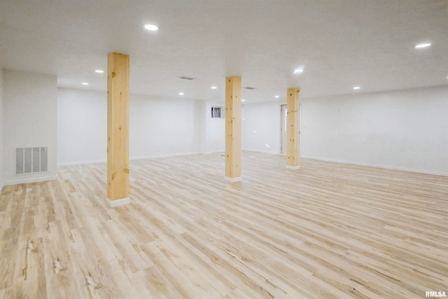 basement featuring light hardwood / wood-style flooring