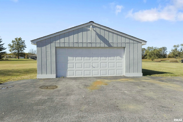 garage with a yard