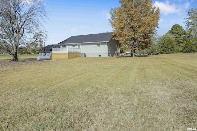 view of yard featuring a sunroom