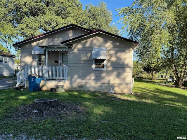 bungalow with a front yard