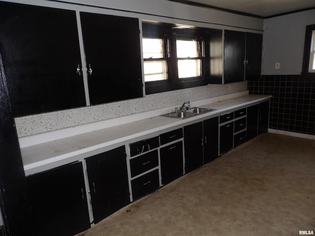 kitchen with sink and tile walls