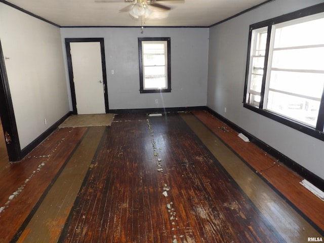 unfurnished room featuring dark hardwood / wood-style floors and ceiling fan