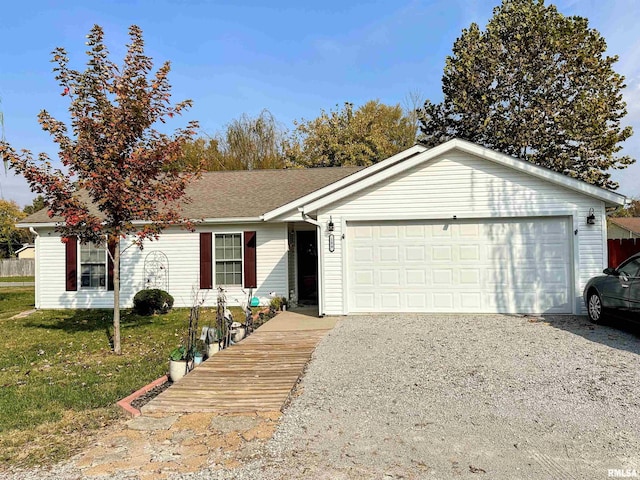 104 Townhouse Dr, Cambria, IL 62915 - single story home with an attached garage, a front lawn, and driveway
