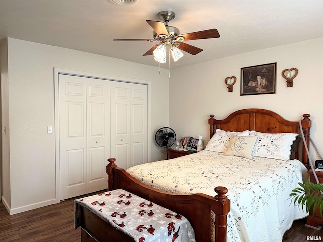 104 Townhouse Dr, Cambria, IL 62915 - bedroom with baseboards, dark wood-style floors, ceiling fan, and a closet