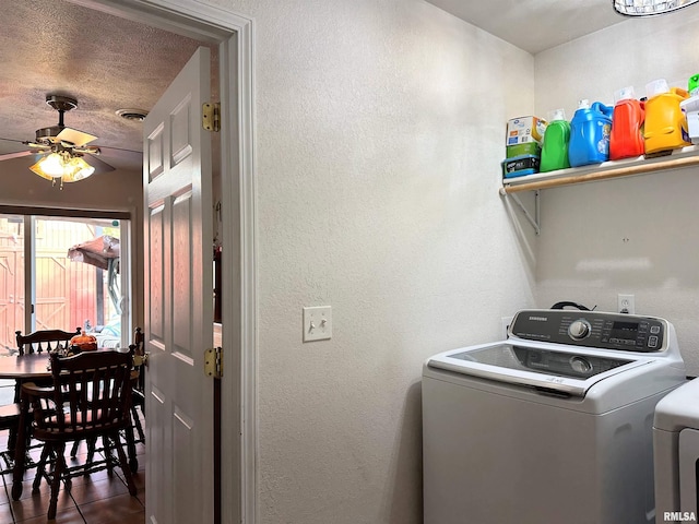 104 Townhouse Dr, Cambria, IL 62915 - clothes washing area with tile patterned floors, ceiling fan, laundry area, and a textured wall