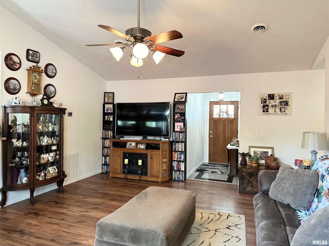 104 Townhouse Dr, Cambria, IL 62915 - living room featuring wood finished floors, ceiling fan, lofted ceiling, and visible vents