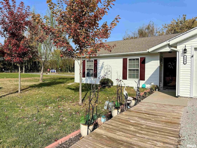 104 Townhouse Dr, Cambria, IL 62915 - wooden terrace with a lawn