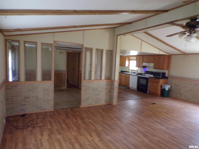 unfurnished living room with lofted ceiling with beams, ceiling fan, and dark hardwood / wood-style flooring