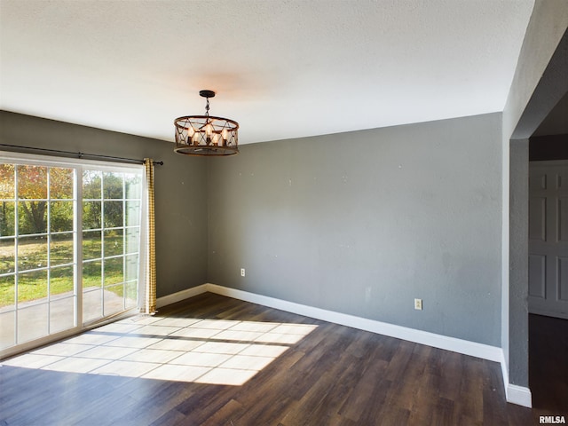 unfurnished dining area featuring light hardwood / wood-style flooring and a chandelier