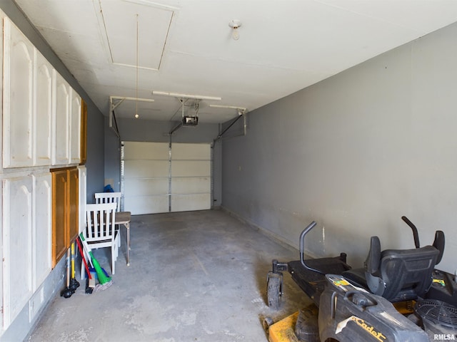 garage featuring a garage door opener