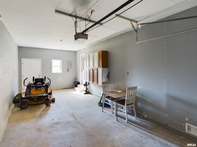 garage featuring a garage door opener