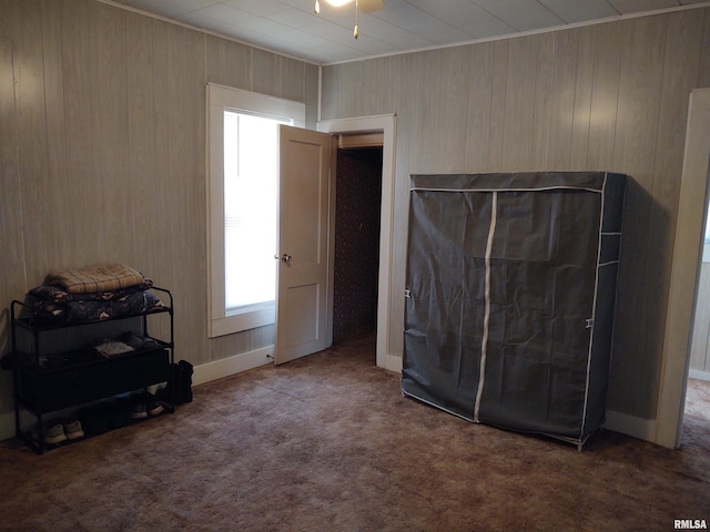 7280 Buncombe Rd, Buncombe, IL 62912 - carpeted bedroom with wood walls