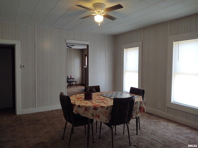 dining room with carpet and ceiling fan