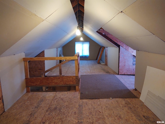 bonus room featuring lofted ceiling