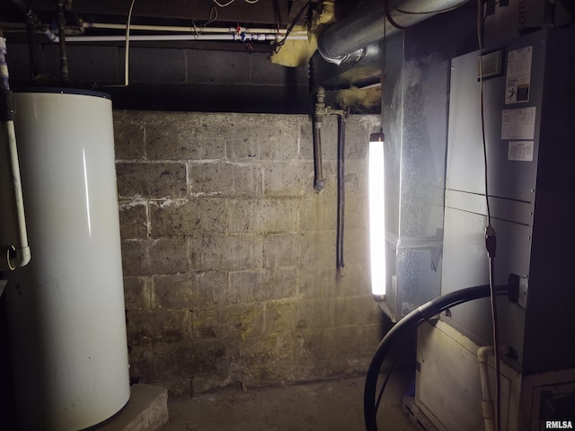 7280 Buncombe Rd, Buncombe, IL 62912 - unfinished basement featuring water heater and heating unit