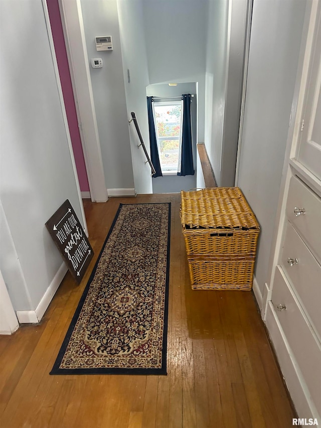 hallway featuring hardwood / wood-style flooring