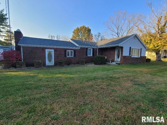 single story home featuring a front yard