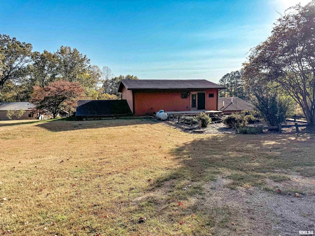 exterior space with a yard