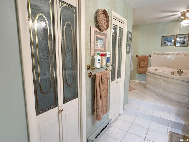 bathroom with baseboard heating, plus walk in shower, tile patterned floors, and ceiling fan