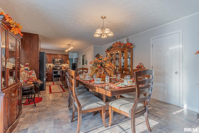 dining space featuring an inviting chandelier, a textured ceiling, and crown molding