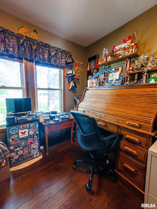 office area with a textured ceiling and hardwood / wood-style flooring