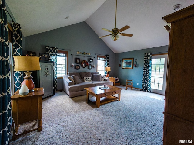 living room featuring carpet flooring, high vaulted ceiling, and ceiling fan