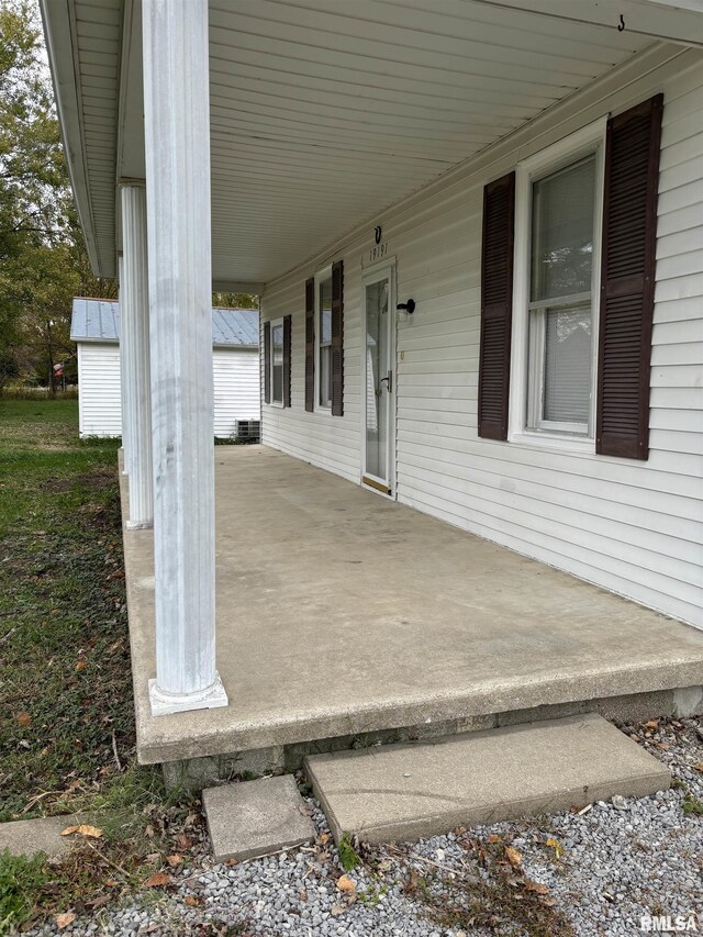 wooden deck featuring covered porch