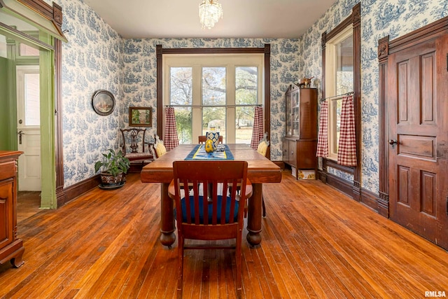 dining area featuring wood-type flooring