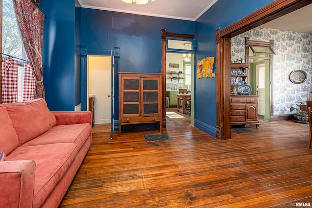 interior space with crown molding and wood-type flooring