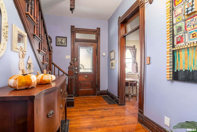 interior space with dark hardwood / wood-style floors