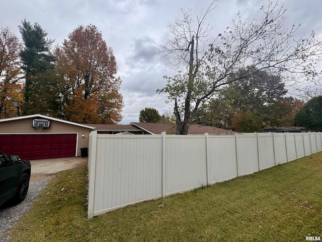 view of yard featuring a garage