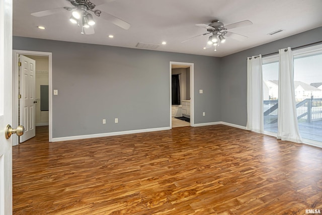 unfurnished room with hardwood / wood-style flooring and ceiling fan